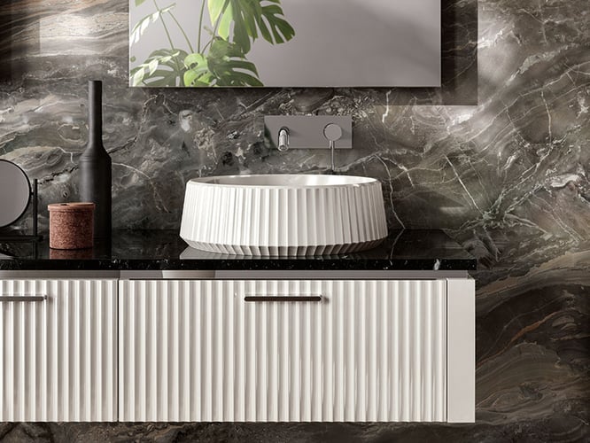 White bathroom vanity with vertical pattern