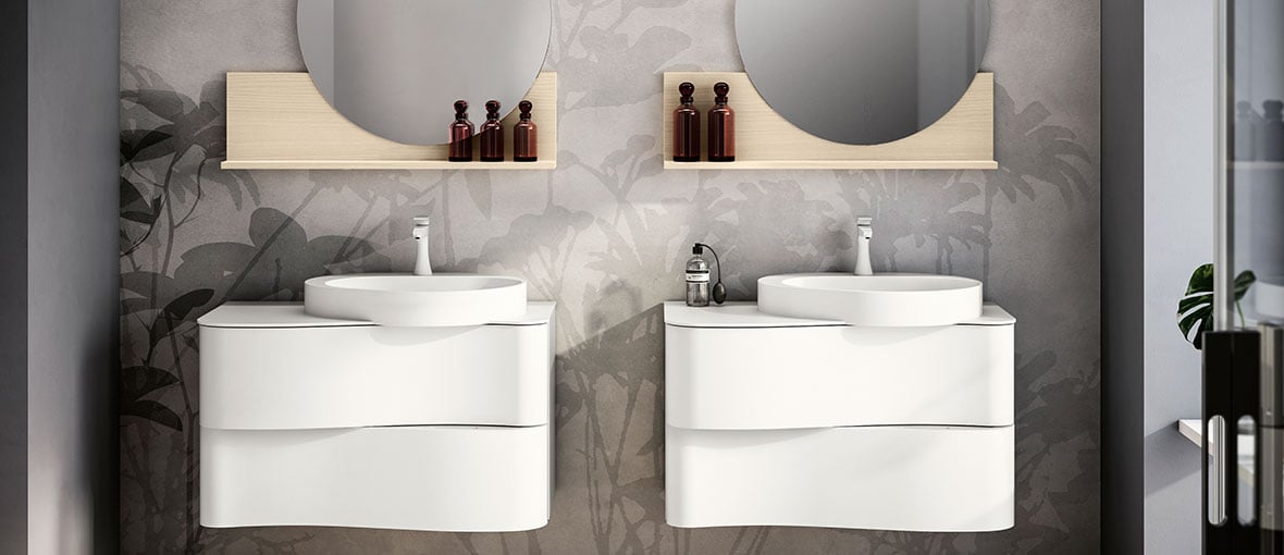 Two white Onda vanities next to each other