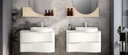 Two white Onda vanities next to each other