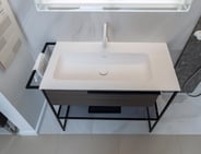 Underground bathroom vanity with towel rail