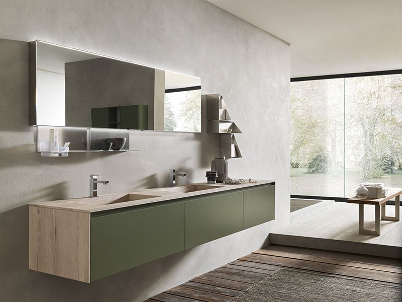Light wood-look bathroom vanity with green cabinet fronts