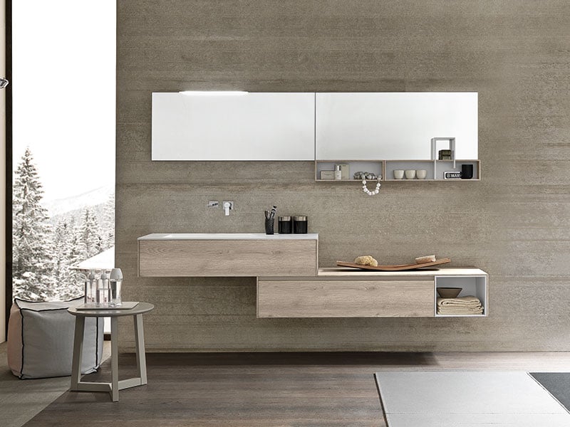 Staggered bathroom vanity countertops and cabinets