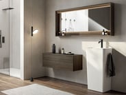 White pedestal bathroom sink in luxury bathroom