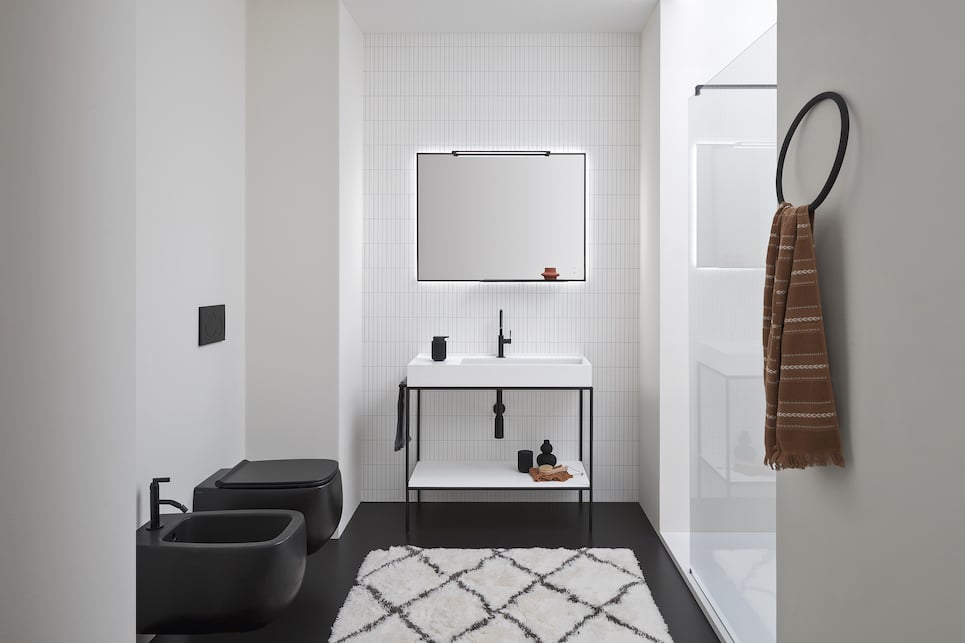 white bathroom console with black framing