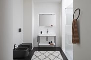 white bathroom console with black framing