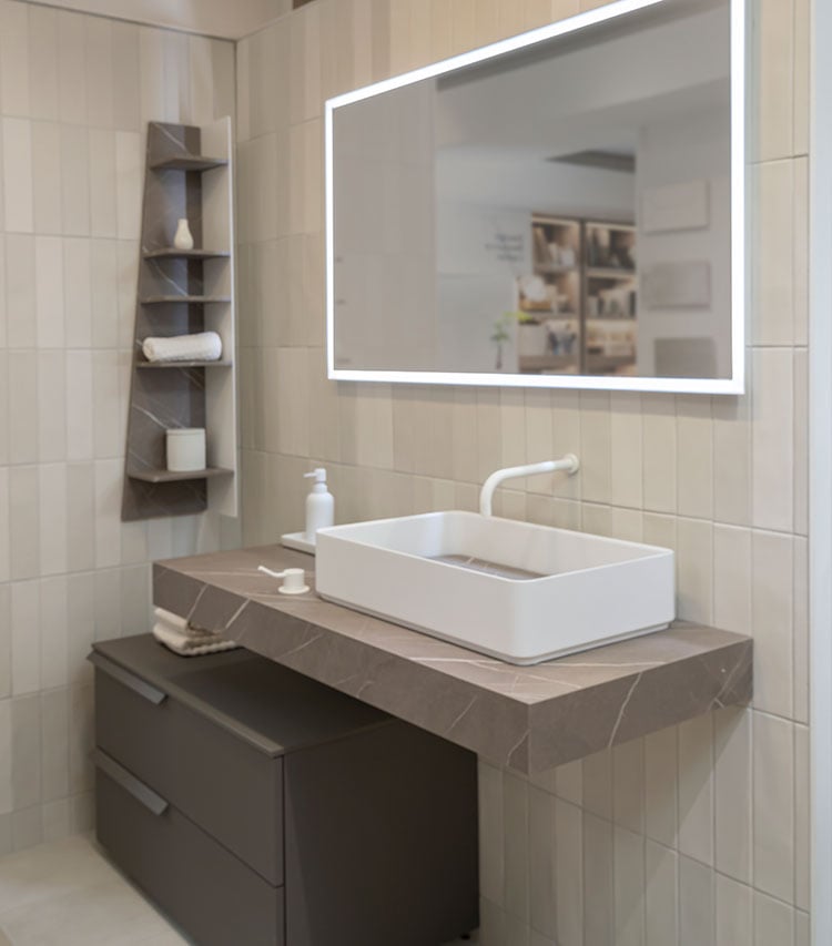Matte marble bathroom countertop with white vessel sink