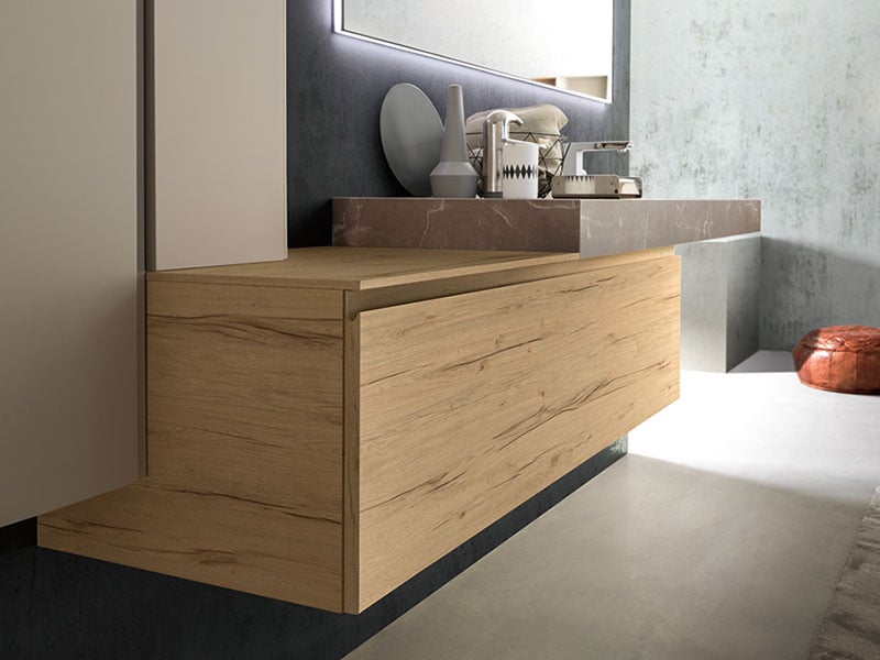 A wooden cabinet with a marble-effect HPL countertop