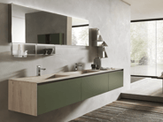 Limestone-look HPL countertop on a green cabinet
