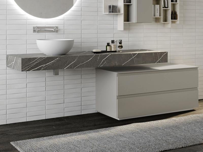 Gray marble-like HPL countertop above a coordinated cabinet with a vessel sink