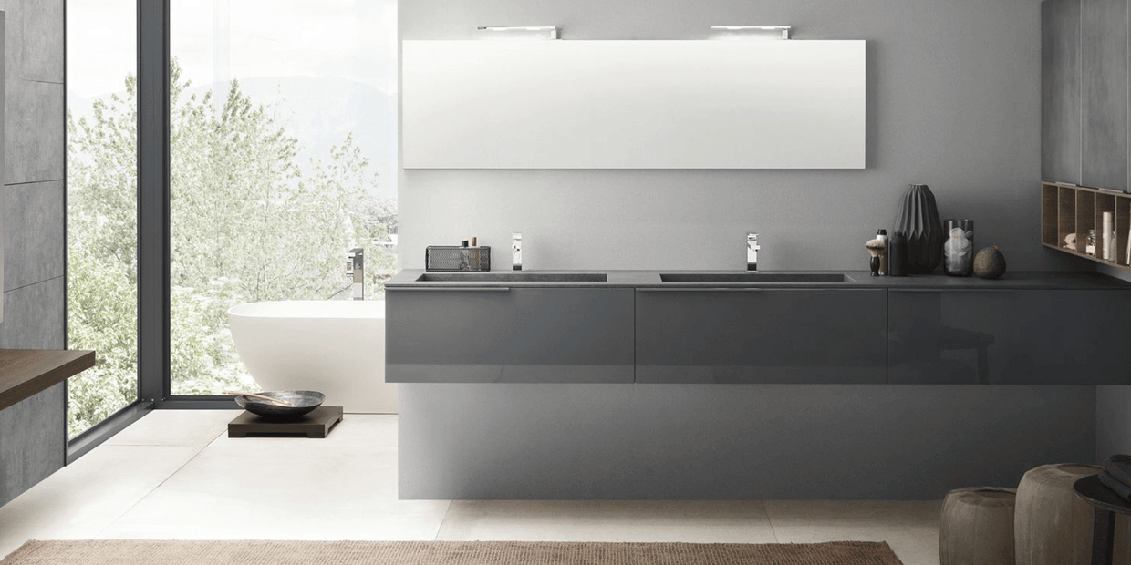 Grey porcelain countertop on a coordinated floating grey vanity