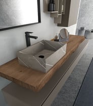 Urban rough-cut countertop with marble-look vessel