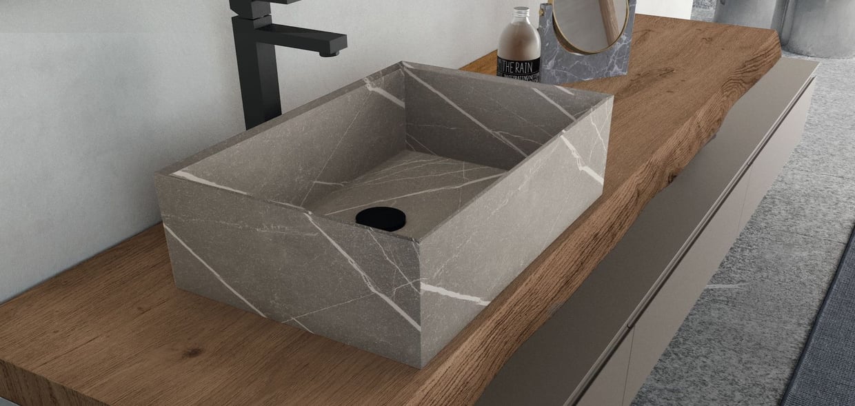 A live-edge wood bathroom countertop with vessel sink