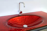 Fire-red Vetro glass countertop with an integrated glass sink