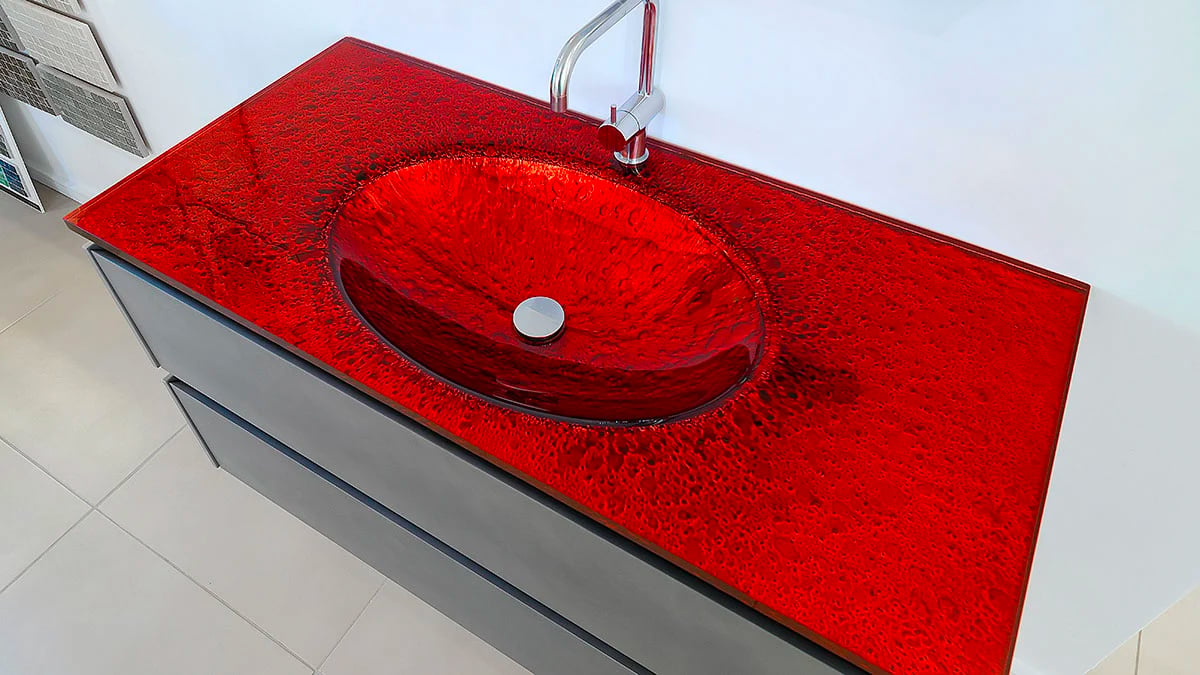 Fire-red Vetro glass countertop in a luxury bathroom