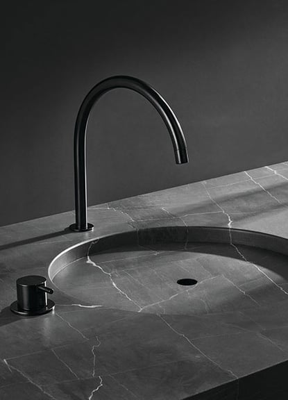 VOLA 590H faucet on marble basin