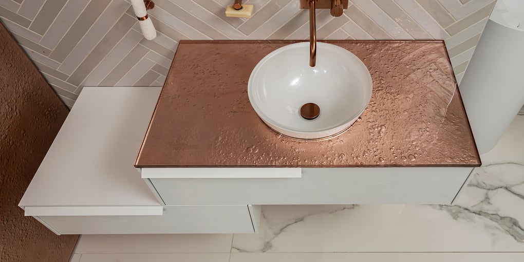 Overhead view of a bathroom vessel with a VOLA faucet