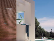 Modern outdoor shower with VOLA shower system