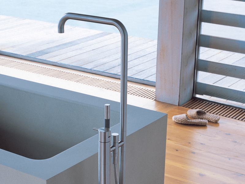 floor-mounted VOLA tub filler with hand shower