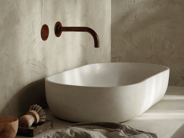 Bronze-colored wall-mounted VOLA faucet