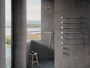 A collection of stainless steel VOLA shower accessories