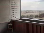 VOLA wall-mounted bathtub filler and towel warmer