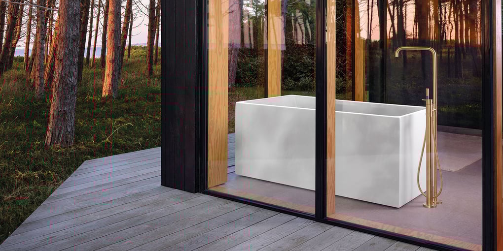 A freestanding floor-mounted VOLA tub filler