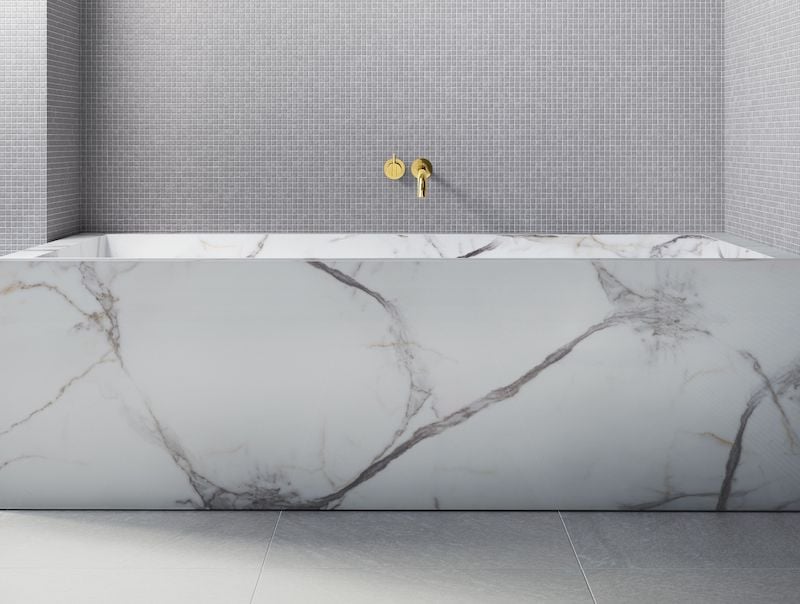gold VOLA wall-mounted tub filler