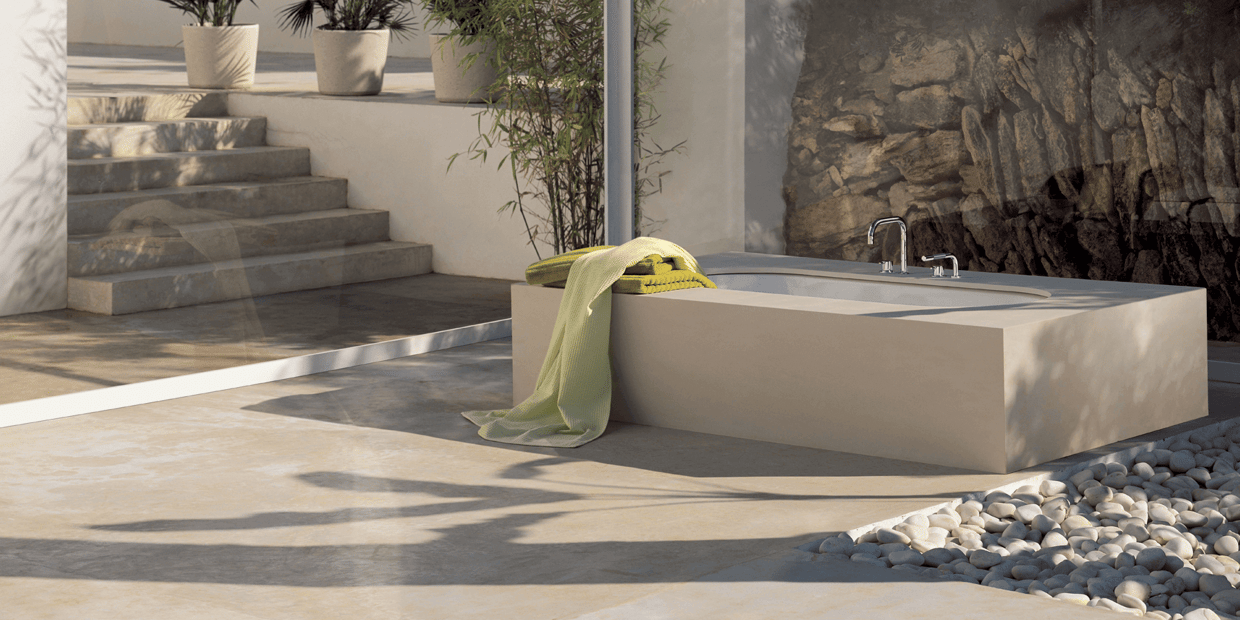 An outdoor bathtub with VOLA tub filler