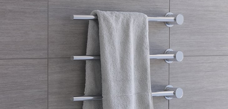 Chrome towel warmers with towel