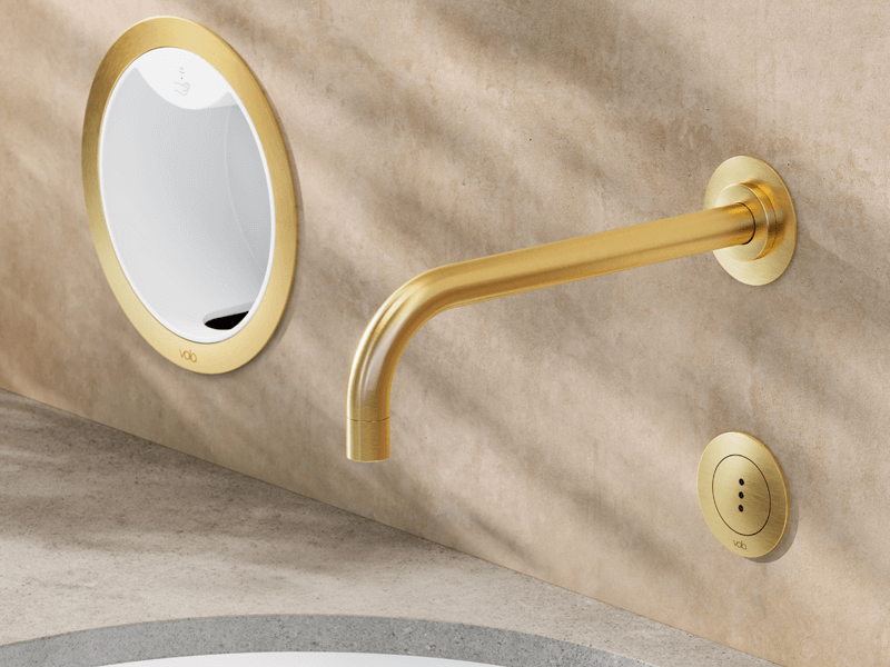 Gold VOLA hands-free faucet