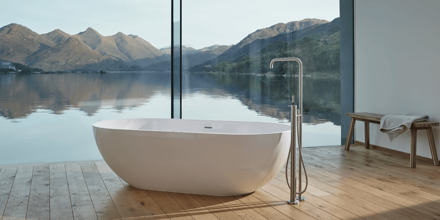 Luxury freestanding tub with VOLA tub filler