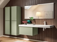 Class storage cabinet in green under vanity countertop
