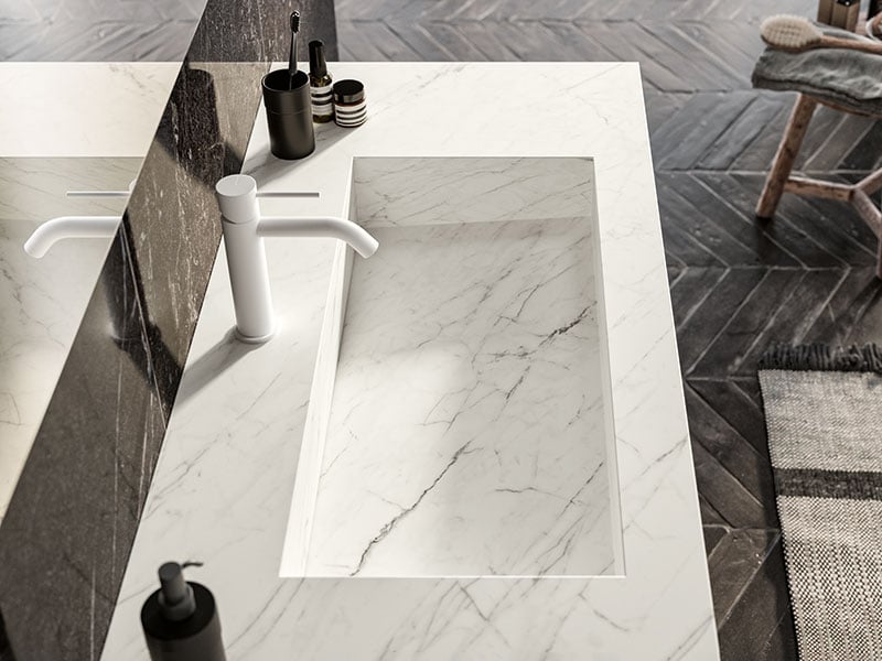 White marble-look bathroom basin with concealed drain