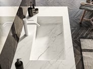 White marble-look bathroom basin with concealed drain