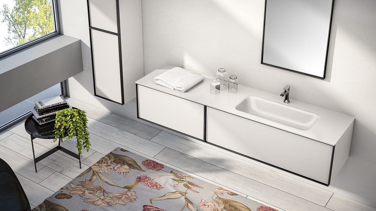 A bathroom wall with a white wall-mounted vanity