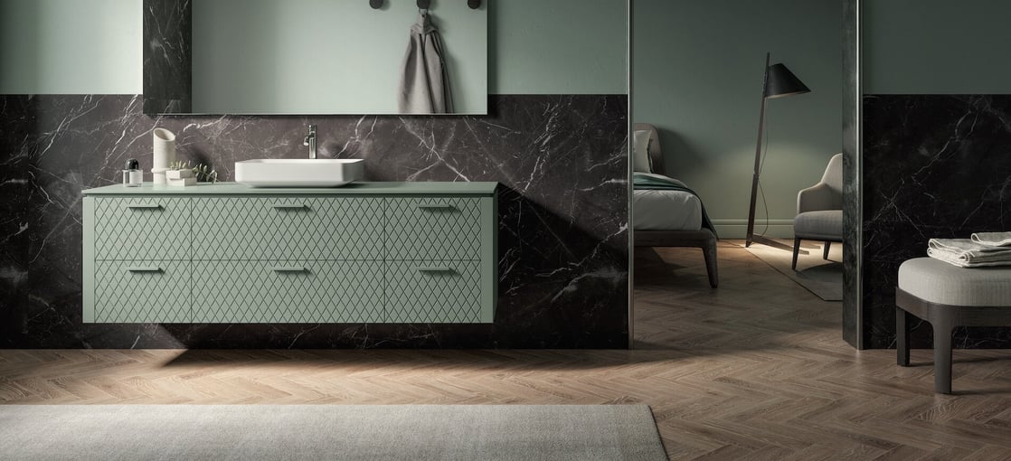 Green bathroom vanity with relief pattern