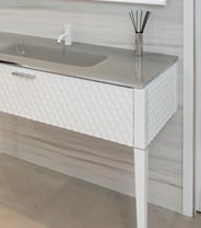 White vanity with grey countertop