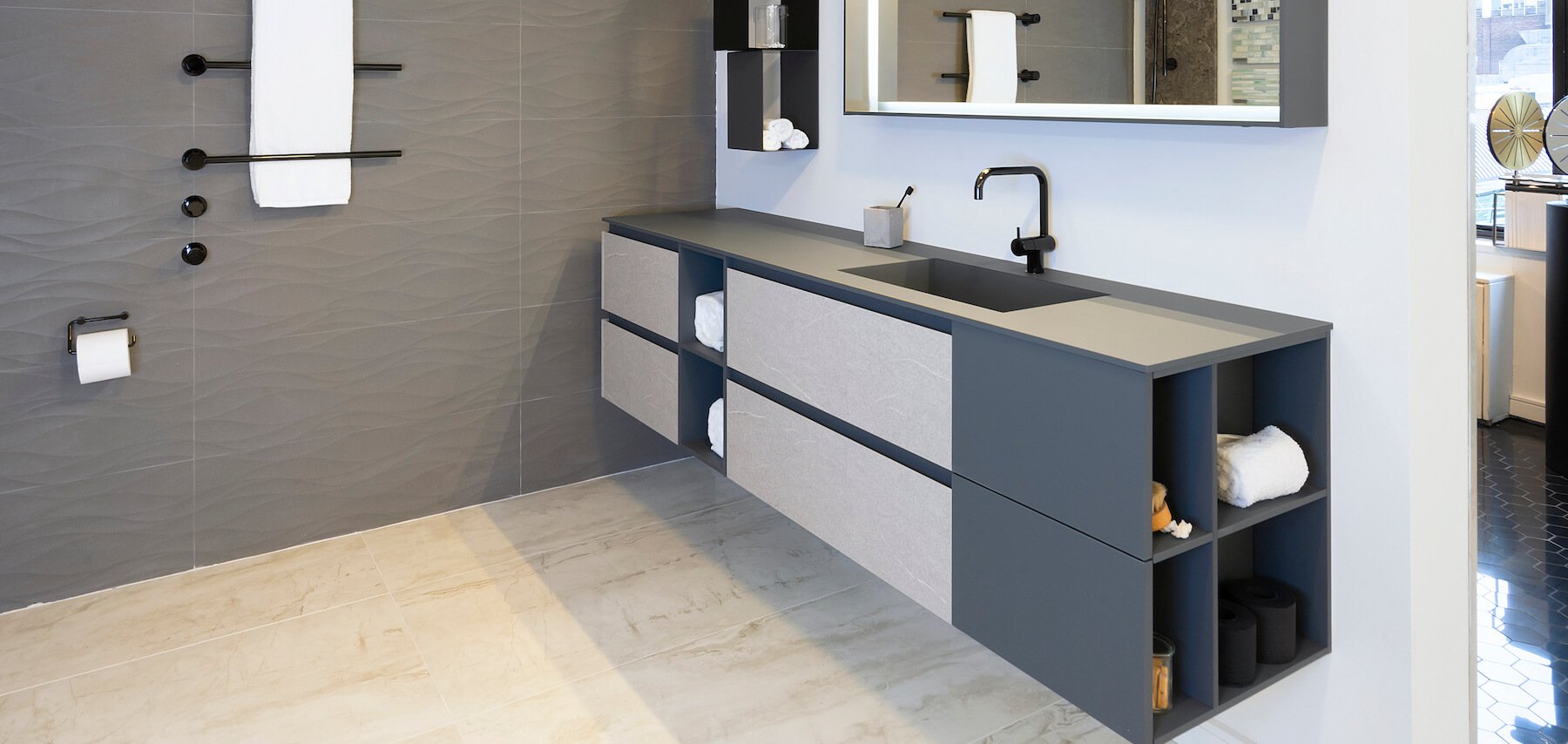 Modern bathroom vanity with integrated basin and open side shelves