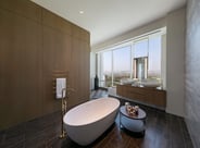Luxury bathroom with VOLA tub filler and towel warmer