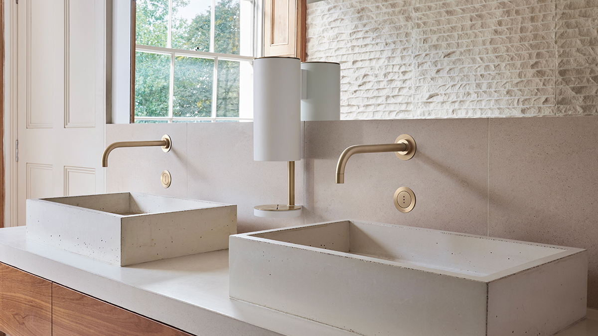 VOLA gold wall-mount bathroom faucets