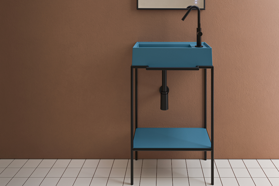 small blue bathroom console with lower shelf